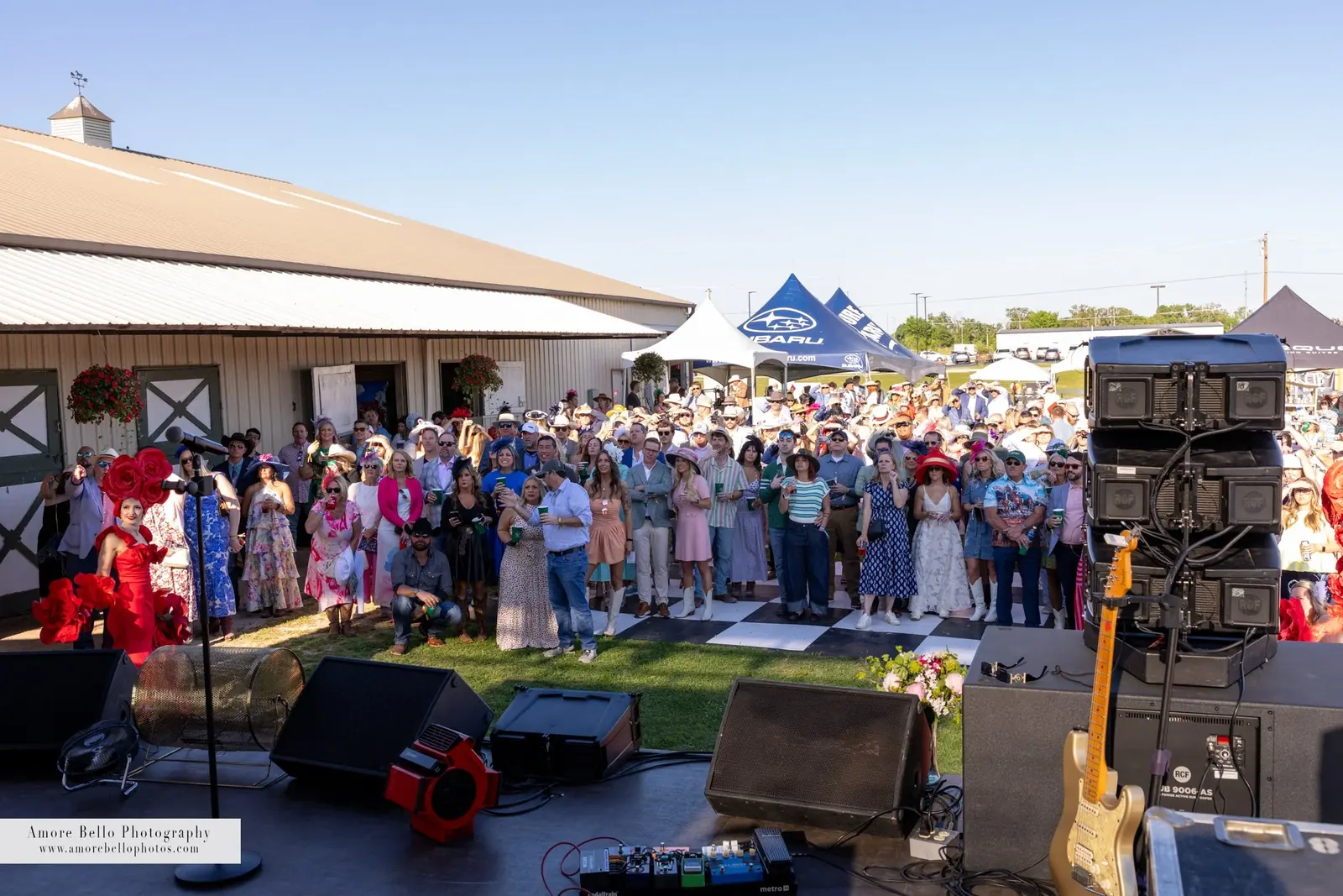 A crowd in Derby attire at the Mini Derby stage