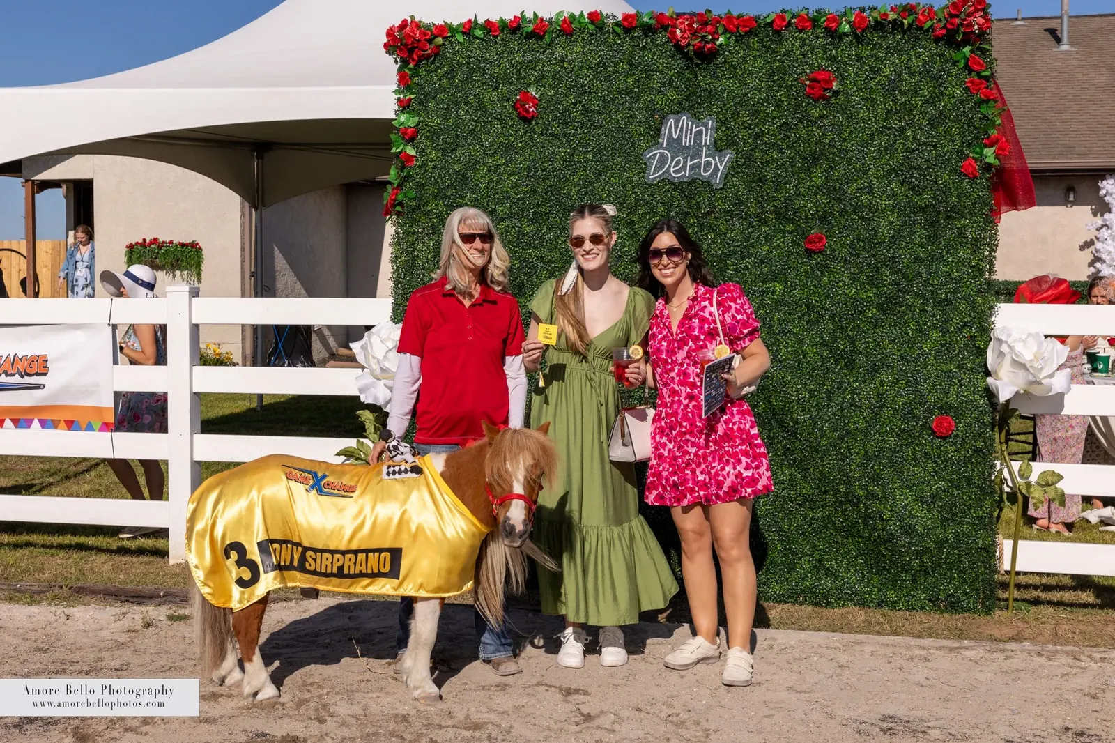 Guests with a mini in a gold number 3 blanket